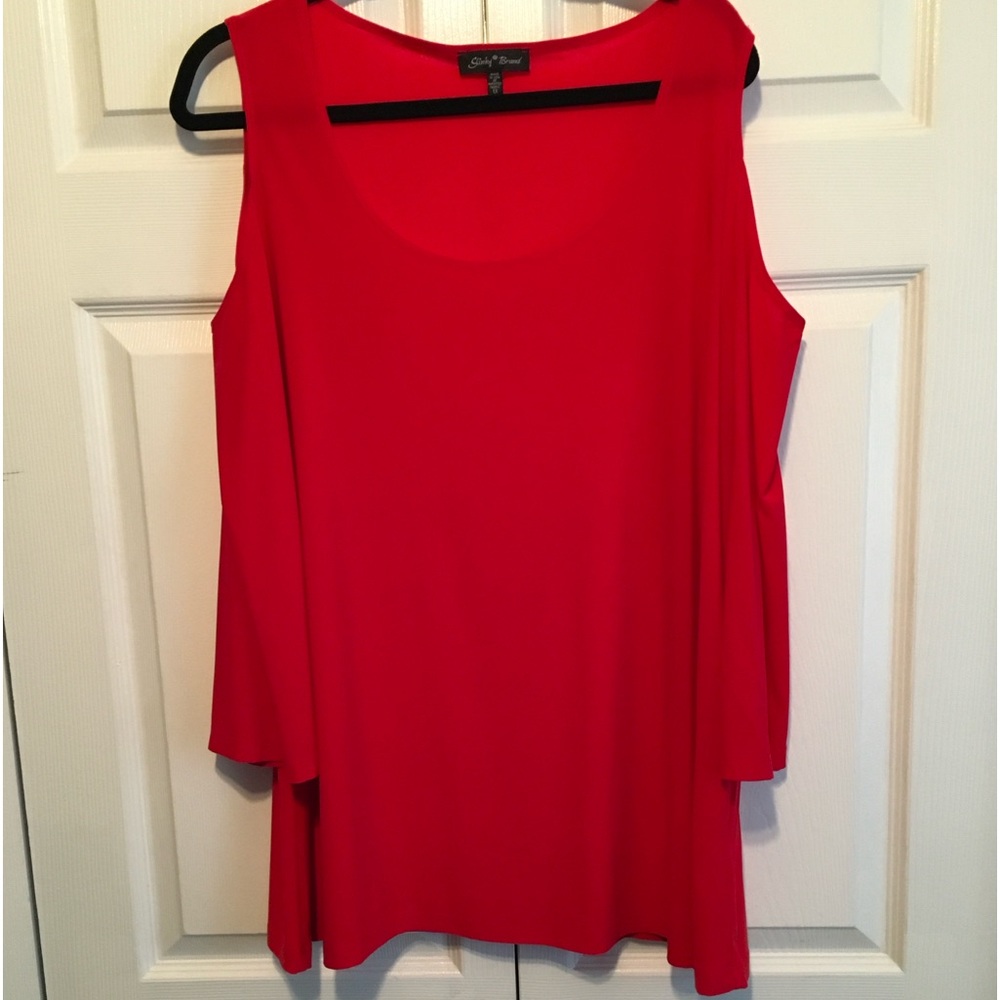 1x cold shoulder red slinky brand shirt.  Hang’s beautifully and hides lumps